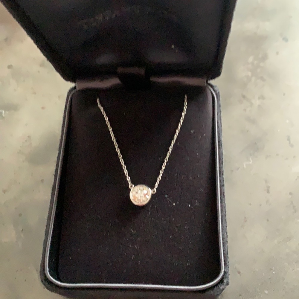 Tiffany & Co platinum and diamond pendant by Elsa Peretti.
